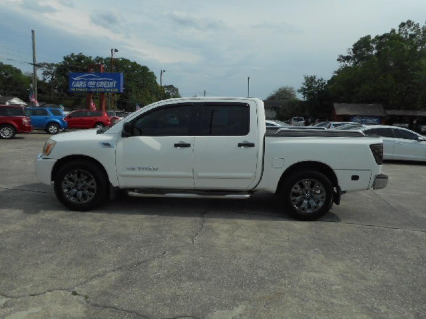 2010 WHITE NISSAN TITAN SE; LE; XE (1N6BA0ED7AN) , located at 10405 Abercorn Street, Savannah, GA, 31419, (912) 921-8965, 31.988262, -81.131760 - Photo#1